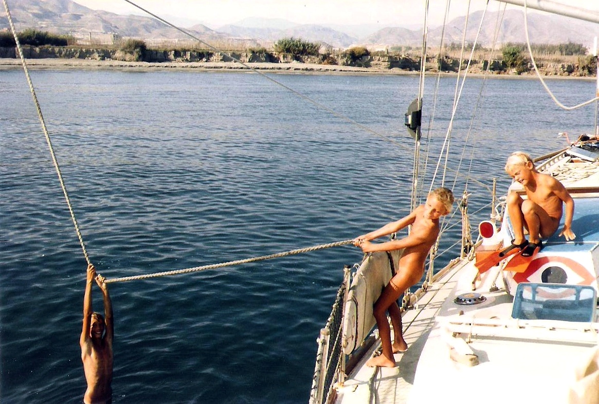 Chricanto at anchor in a small Spanish harbour.