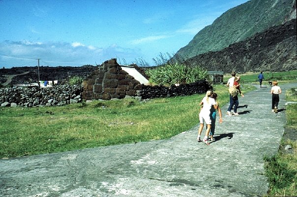 A village road with the new volcano behind.